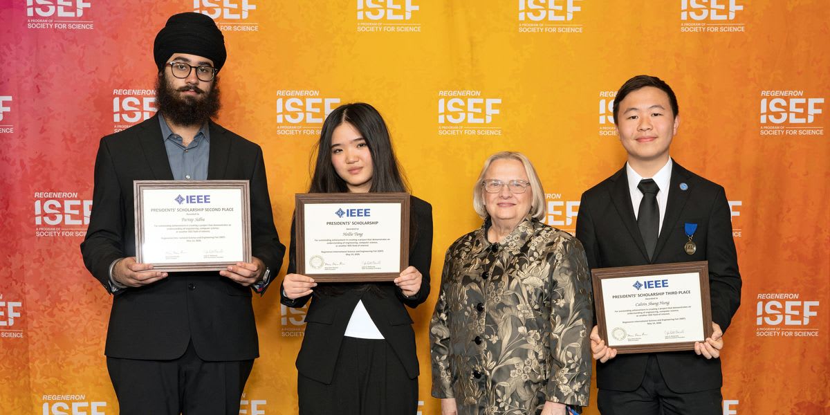 Three high school students holding IEEE Presidents' Scholarship awards for assistive technology inventions