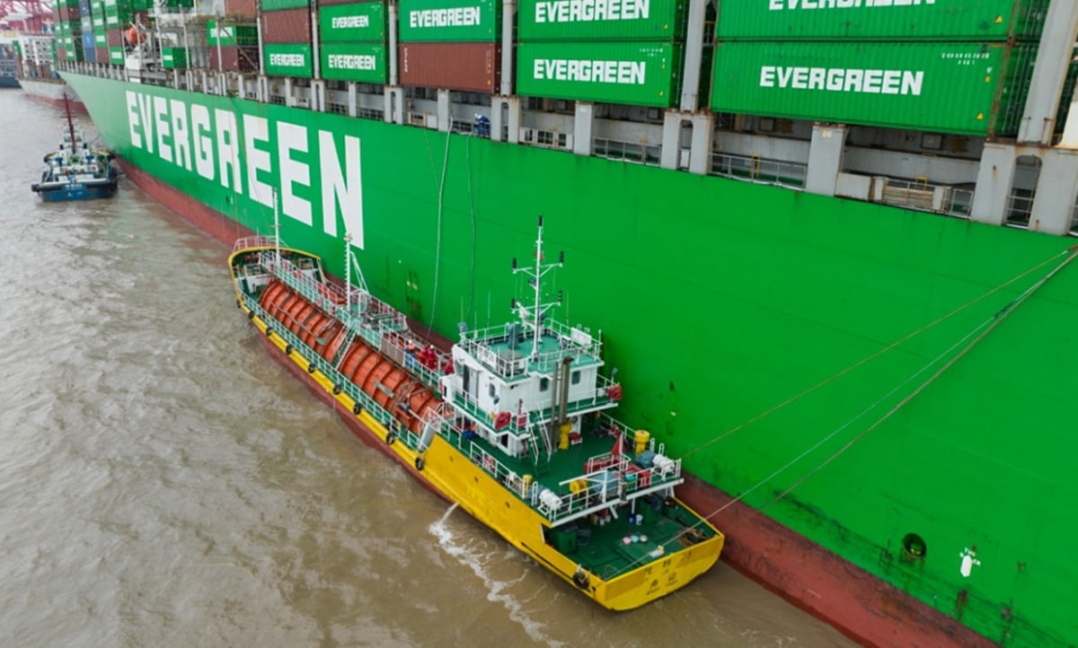 Cargo ship at sea with carbon capture equipment installed on deck