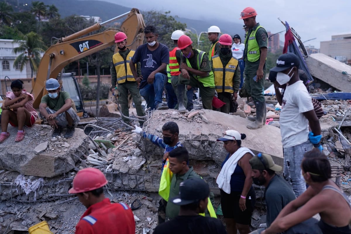 Rescue workers at Venezuela Red Cross headquarters using digital platform after earthquake