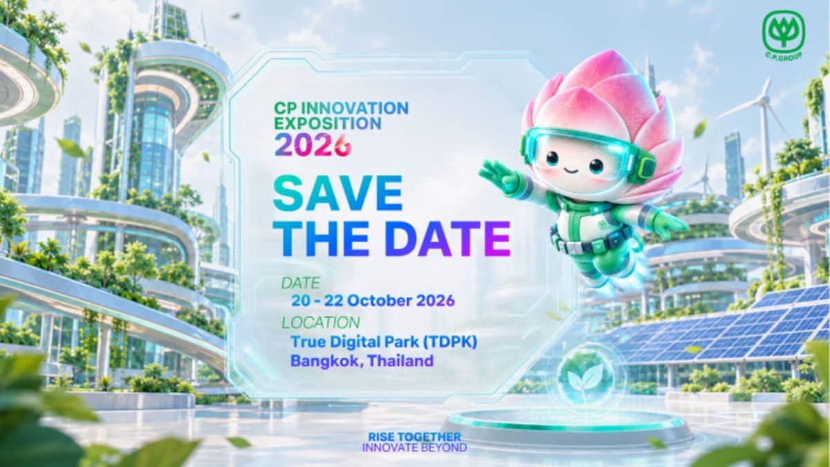 Diverse crowd exploring interactive technology displays at Thailand innovation festival exhibition hall