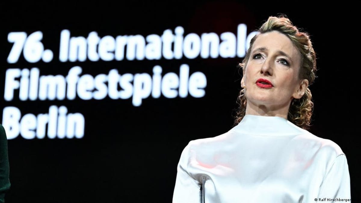Tricia Tuttle speaking at podium during Berlin International Film Festival ceremony