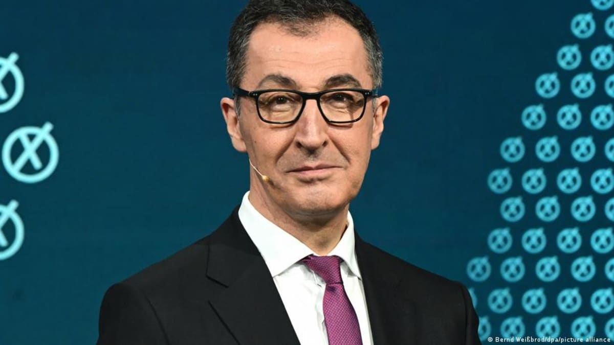 ** Cem Özdemir, Germany's first state premier with Turkish roots, smiling in Baden-Württemberg