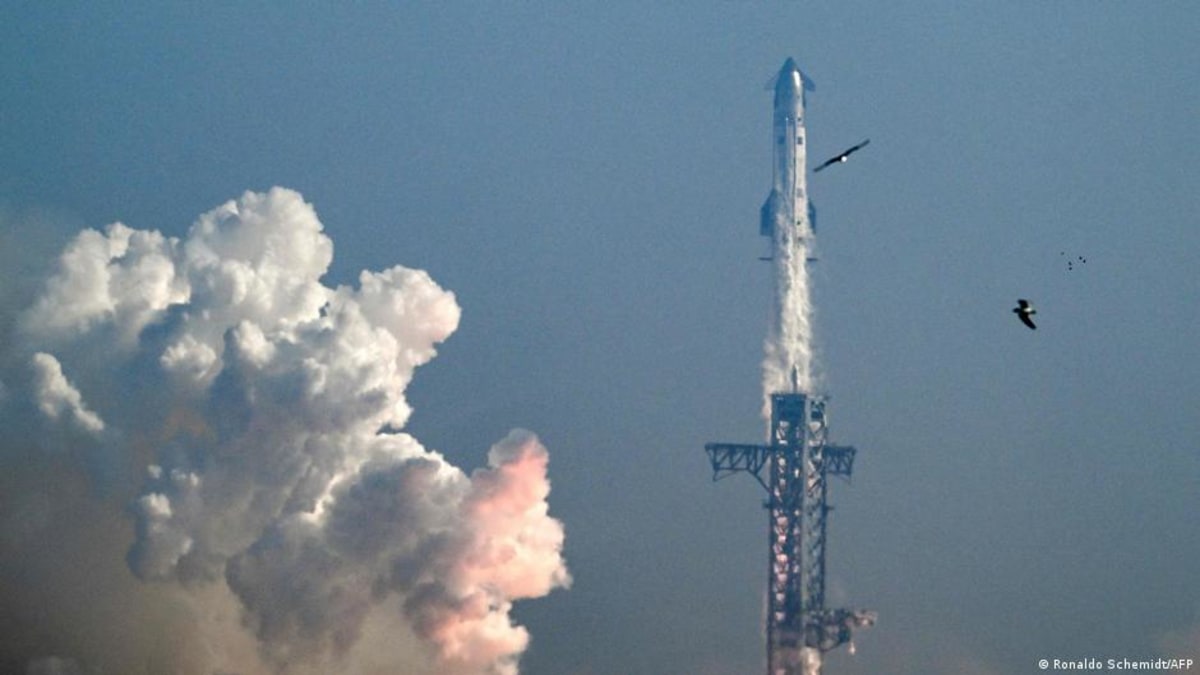 ** SpaceX's massive 407-foot Starship rocket launching from Texas amid clouds of smoke and fire