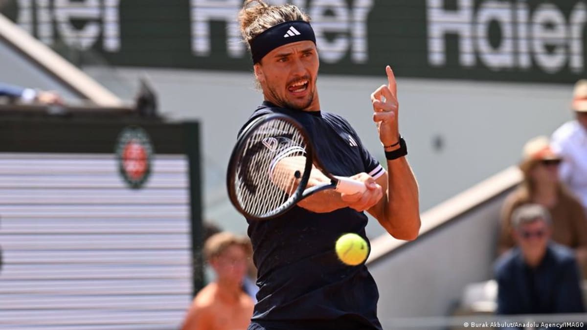Alexander Zverev celebrating with trophy after winning 2025 French Open tennis championship