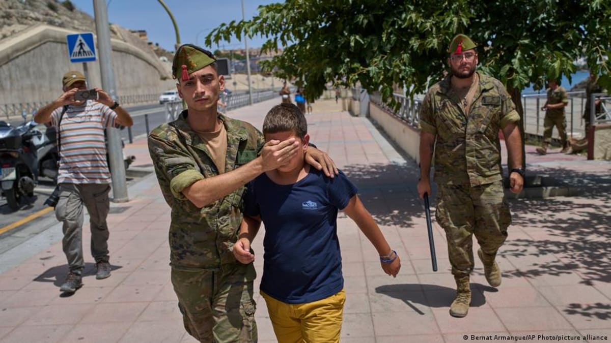 Young girls walking toward safety in Spain's child protection program from Ceuta