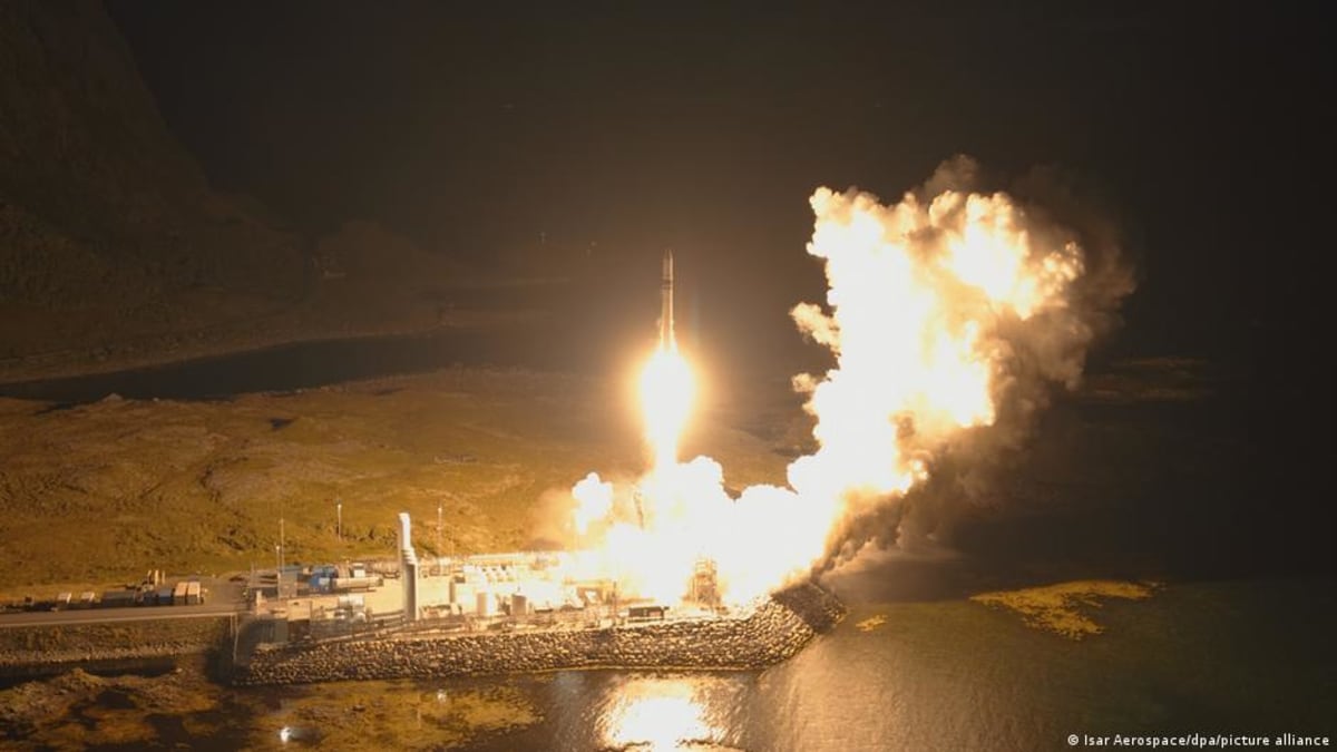 Spectrum rocket launching into sky from Norwegian spaceport trailing bright flames