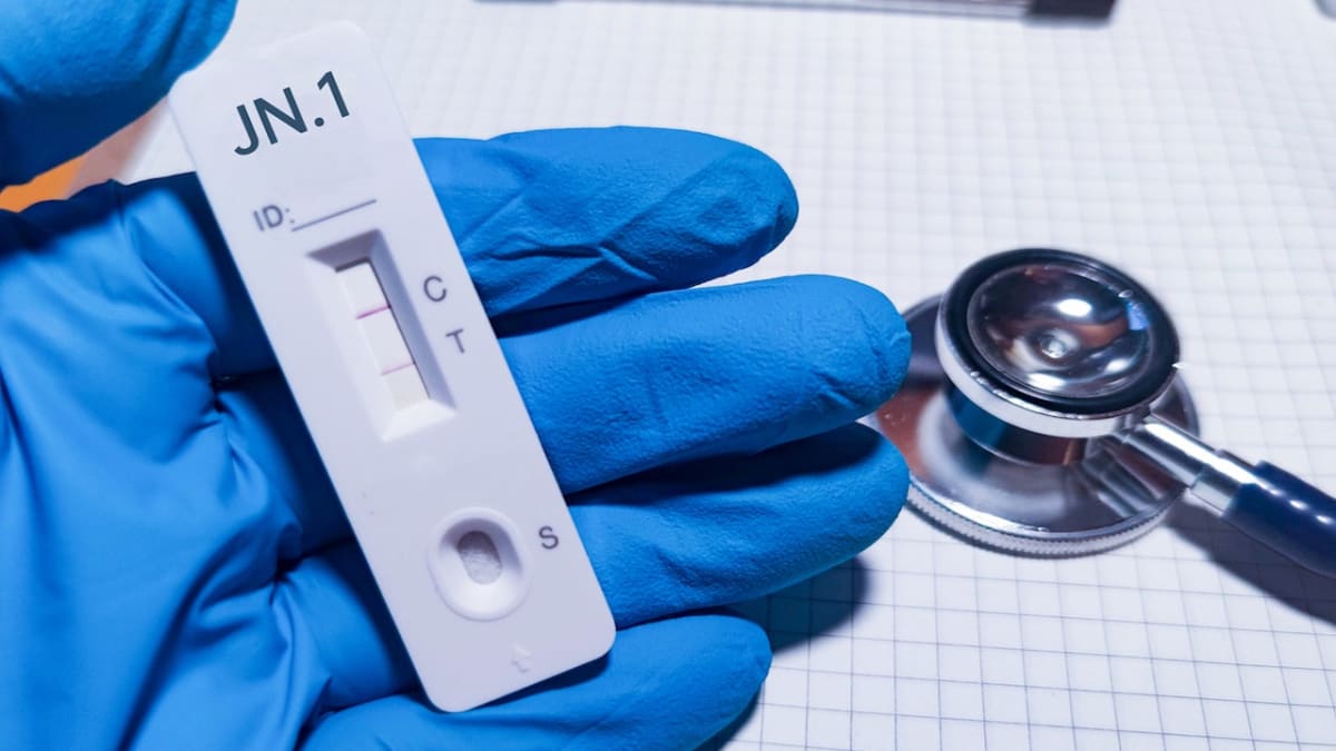Medical researcher examining lab samples representing Long COVID treatment development and scientific progress