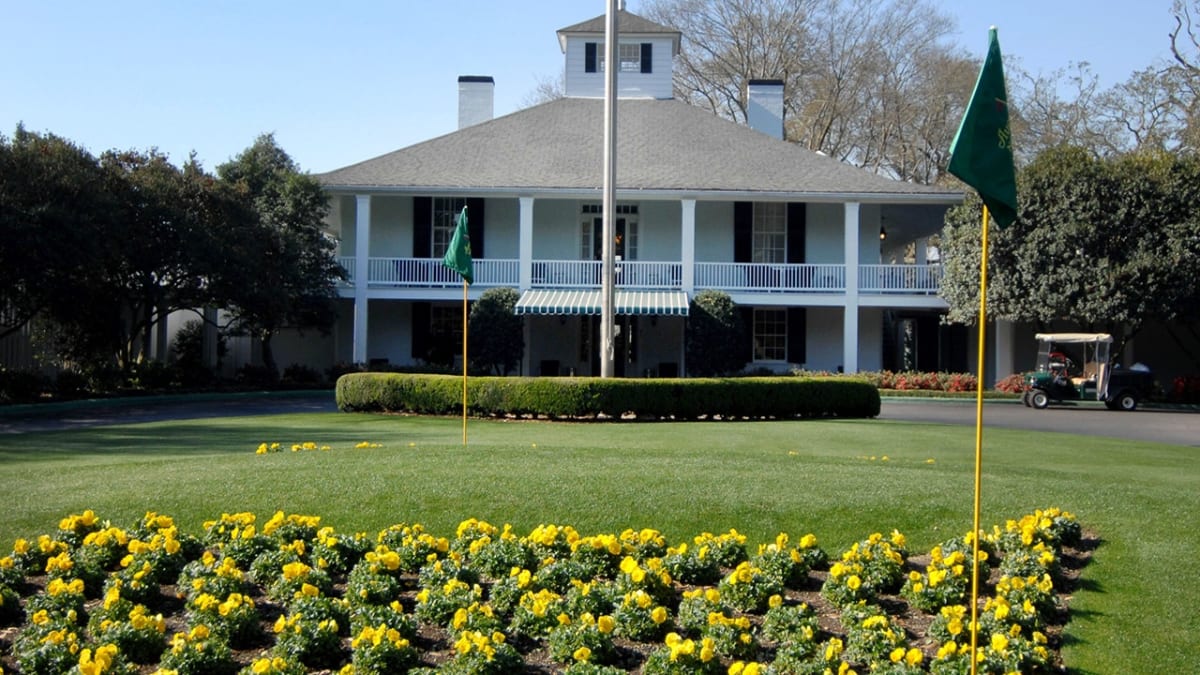 Families watching golf together at Augusta National during Masters Tournament opening day