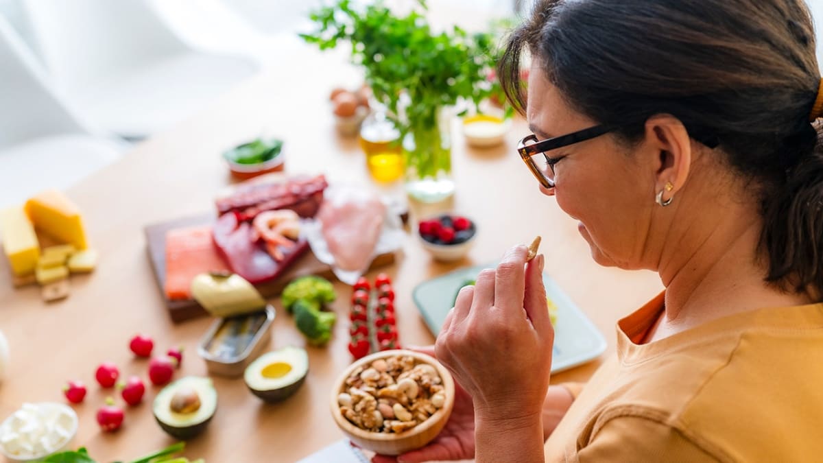 Healthy food ingredients arranged on kitchen counter representing different diet approaches