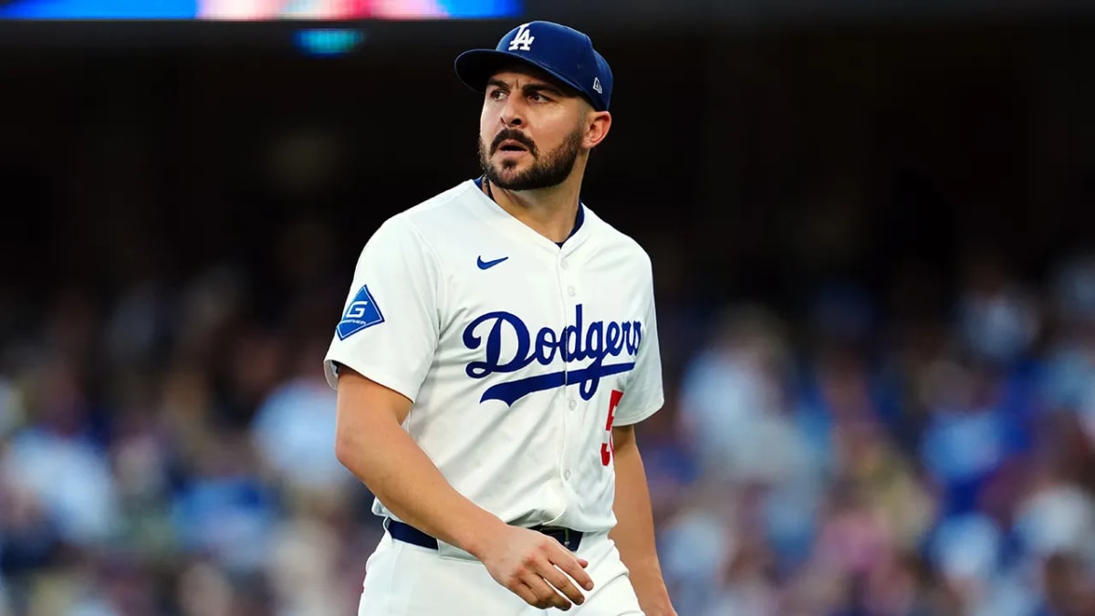 Alex Vesia in Los Angeles Dodgers uniform walking to dugout at stadium
