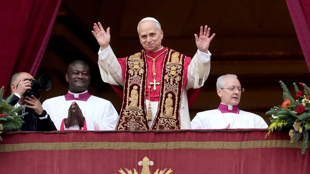Pope Leo XIV waves to crowd during Easter Mass at St. Peter's Square Vatican
