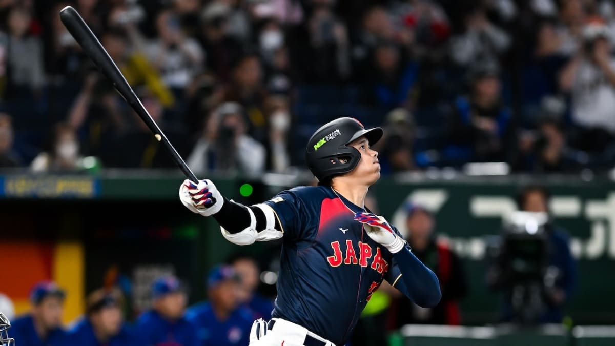 Shohei Ohtani swinging bat during grand slam for Team Japan at Tokyo Dome