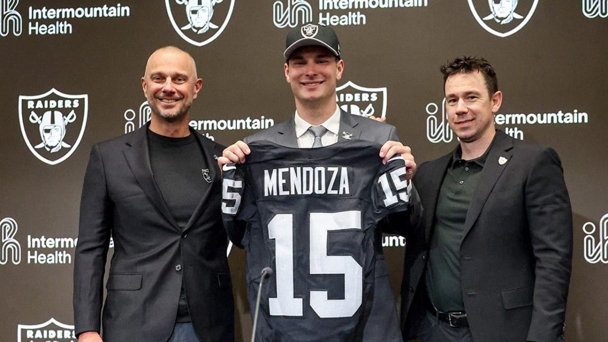 Fernando Mendoza in Raiders cap at press conference after being selected first overall pick