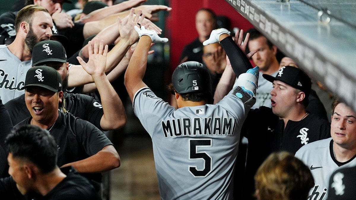 Munetaka Murakami celebrating home run with Chicago White Sox teammates in Phoenix stadium