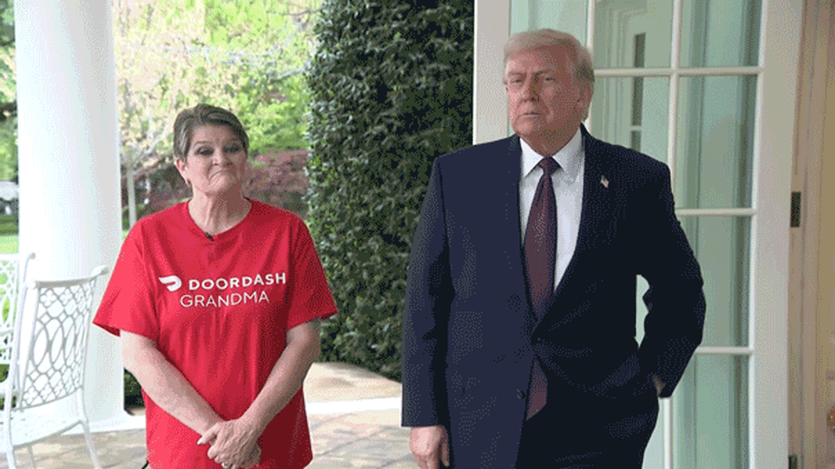 DoorDash delivery driver Sharon Simmons receiving McDonald's bags at White House event