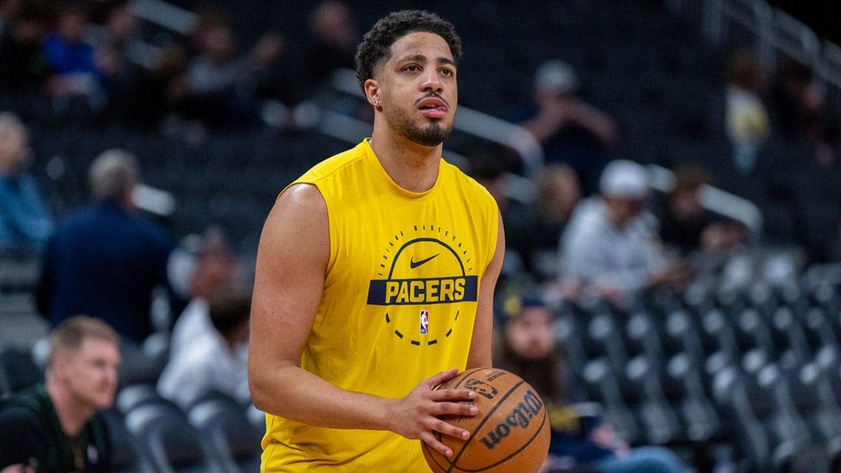 Indiana Pacers guard Tyrese Haliburton standing on basketball court during warmups