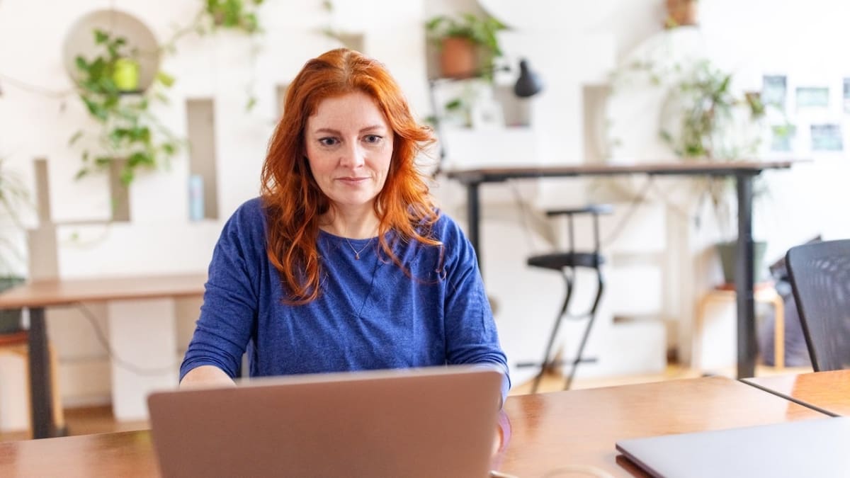 Close-up of person with natural red hair showing genetic trait selected by evolution