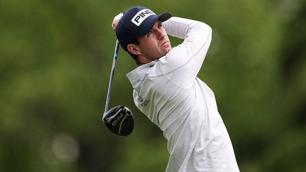 Alex Smalley chips onto green during PGA Championship at Aronimink Golf Club in Pennsylvania