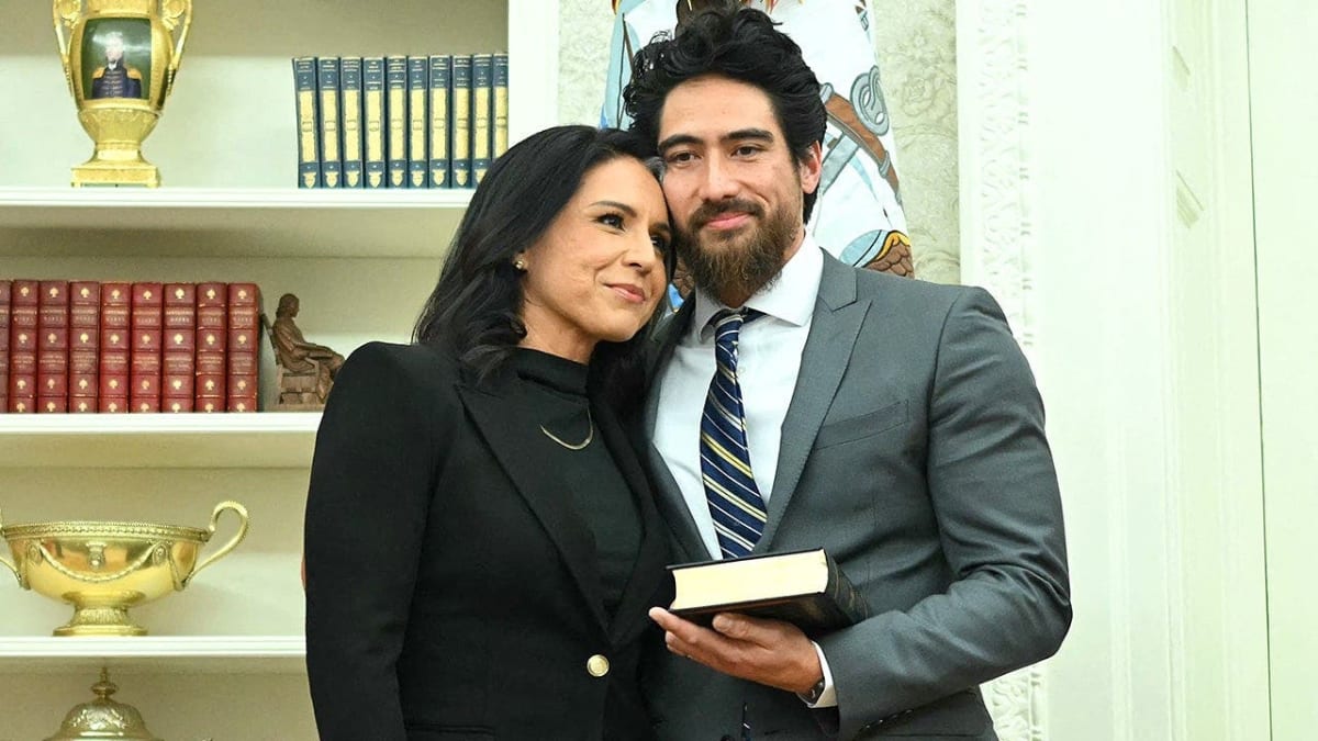 Tulsi Gabbard and husband Abraham Williams embracing in emotional moment after cancer surgery