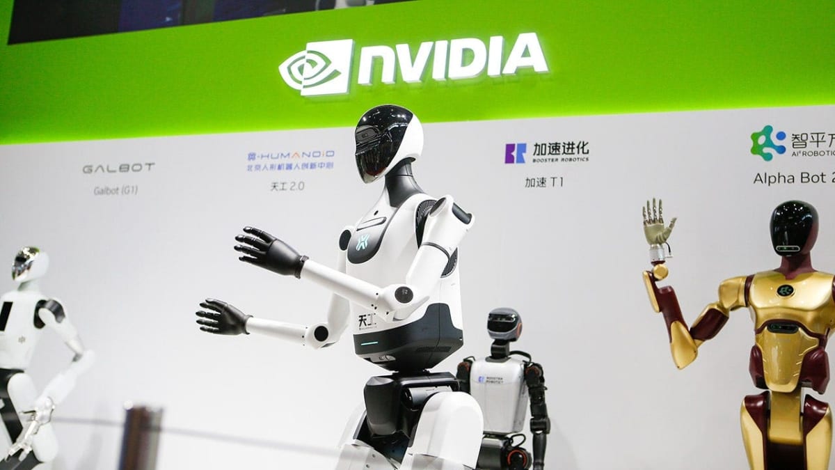 Humanoid robot working safely alongside human workers in modern warehouse facility