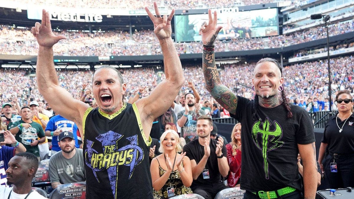 Jeff Hardy climbing ladder during TNA Slammiversary championship match in wrestling ring