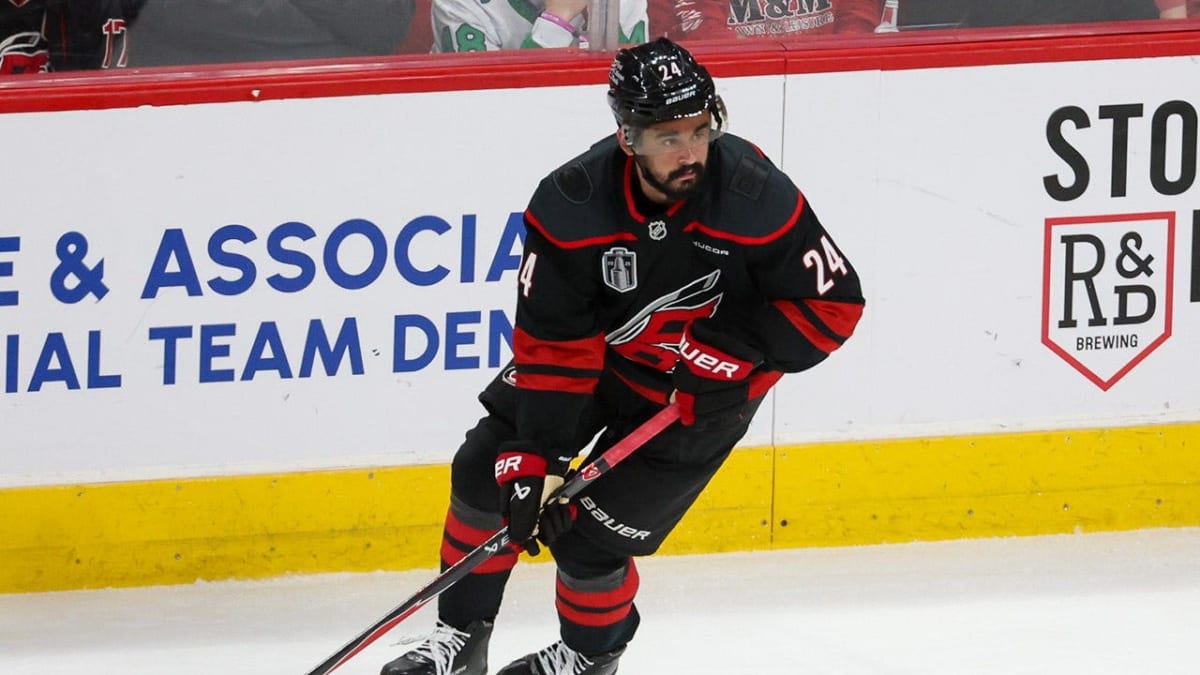 Seth Jarvis celebrates overtime goal as Carolina Hurricanes teammates rush to congratulate him