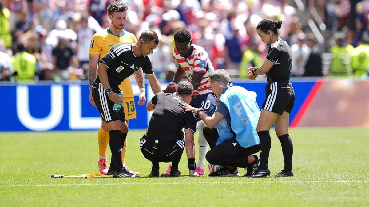 Soccer Star Helps Cramping Referee Stretch Mid-Match