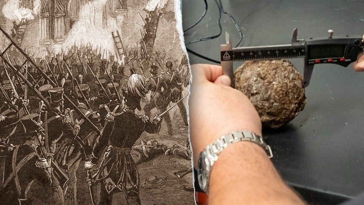 Rusted orange-brown iron cannonball from 1836 Battle of the Alamo being excavated by archaeologists