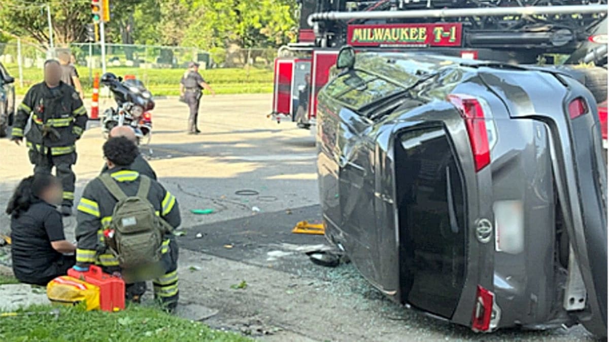 Federal agents assisting woman freed from overturned vehicle after Milwaukee intersection crash