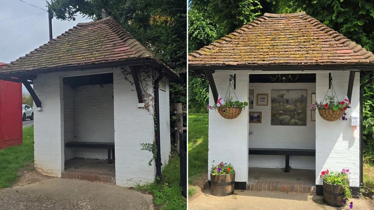Renovated bus shelter in Chilham Kent decorated with hanging flower baskets and painted exterior
