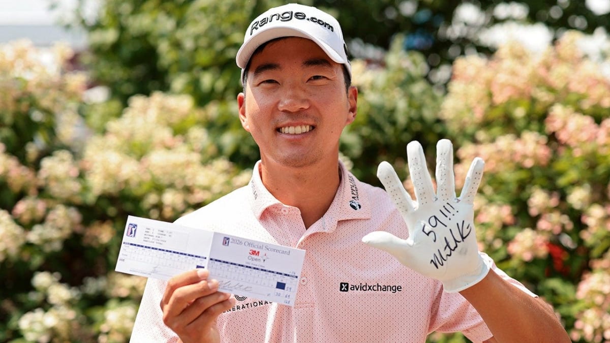 Golfer Michael Kim celebrates with fist pumps after sinking historic birdie putt at 3M Open