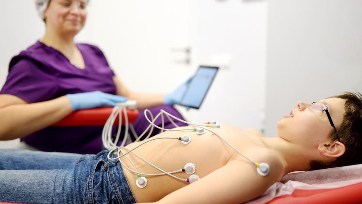 High school student athlete undergoes electrocardiogram heart screening required by Florida law