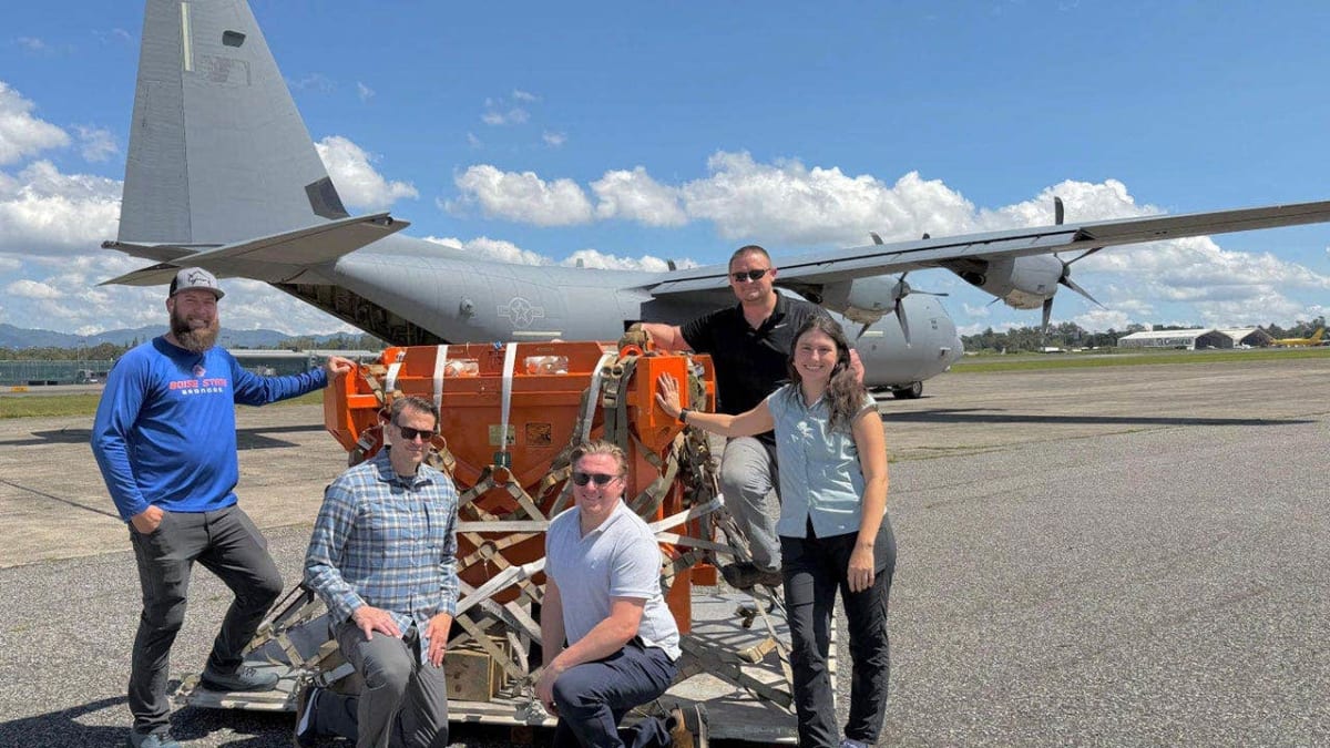 Specialized security team members securing radioactive material package for safe international transport