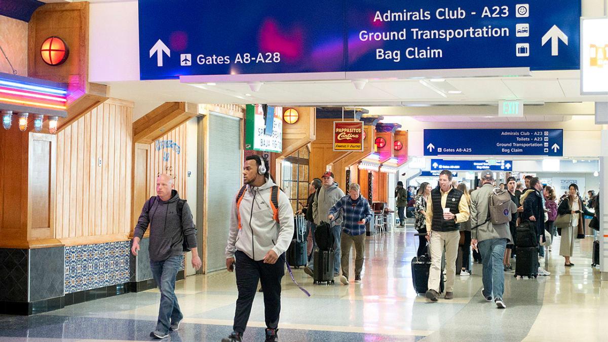 Modern airport bathroom interior with clean floors and accessible facilities for international travelers