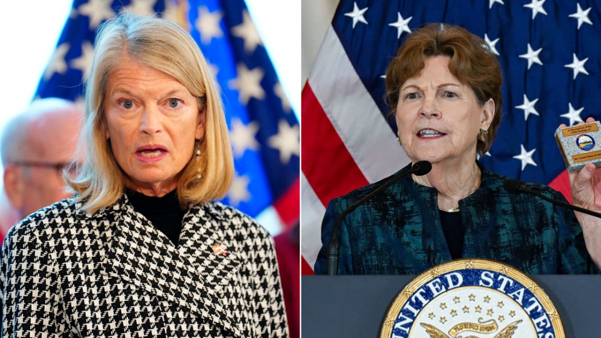 Two U.S. senators collaborating on bipartisan humanitarian aid letter at Capitol Hill
