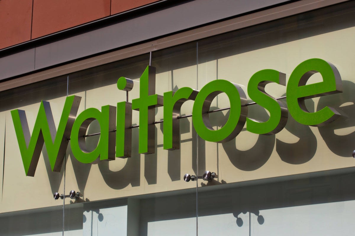 Waitrose grocery store exterior in London showing company signage and entrance
