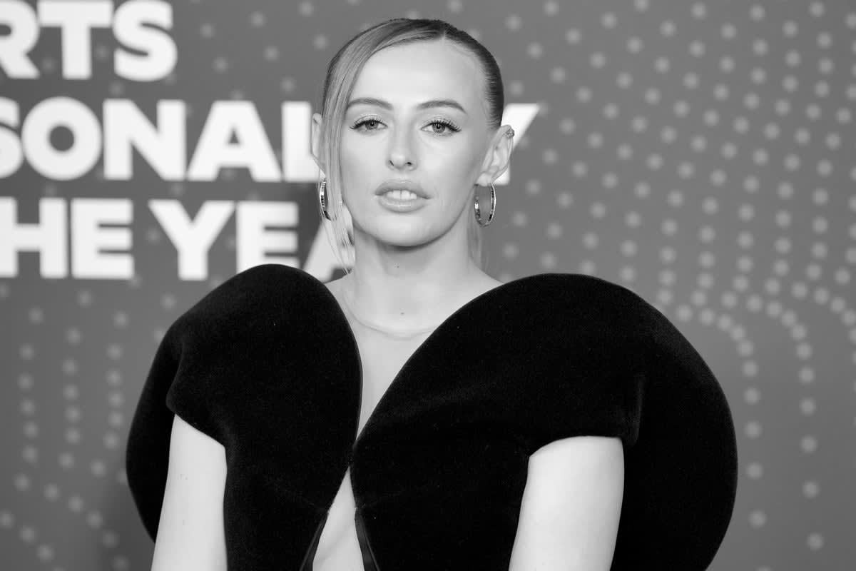 Chloe Kelly celebrating in England football kit after scoring winning penalty at Euro 2025