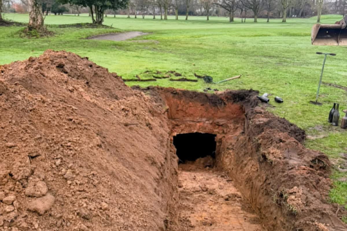 Historic brick wine cellar discovered underground at Manchester golf course containing Victorian-era bottles