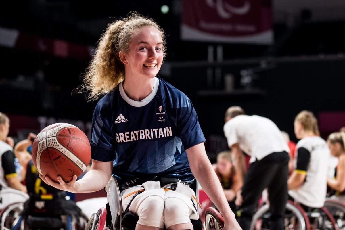 Paralympic wheelchair basketball athlete Siobhan Fitzpatrick speaking at education conference about inclusive sports