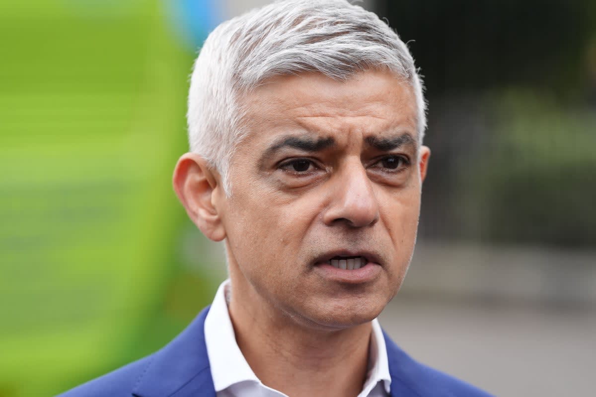 Mayor Sadiq Khan speaking at podium announcing technology abuse prevention initiative in London