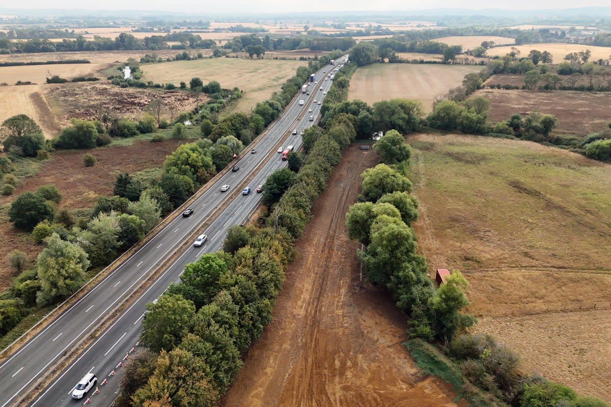 Before and after photos showing cleared riverside field where massive illegal waste pile once stood