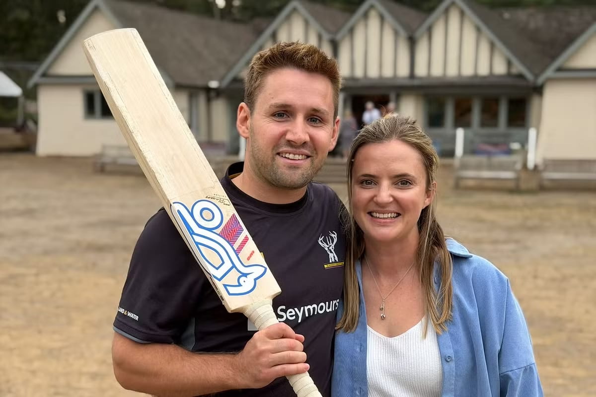 Peter Melhuish and fiancée Izzy Upton smiling together before their wedding and cricket adventure