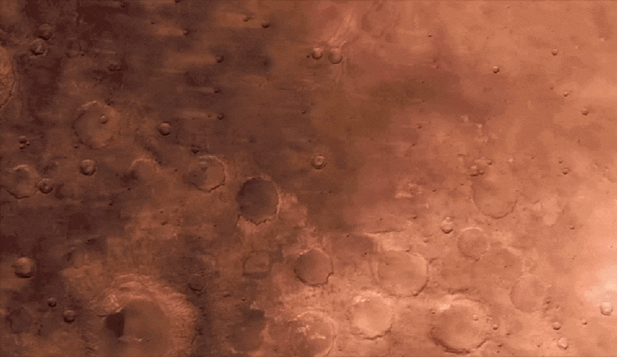 Time-lapse view of Mars from NASA's Psyche spacecraft showing craters and polar ice caps