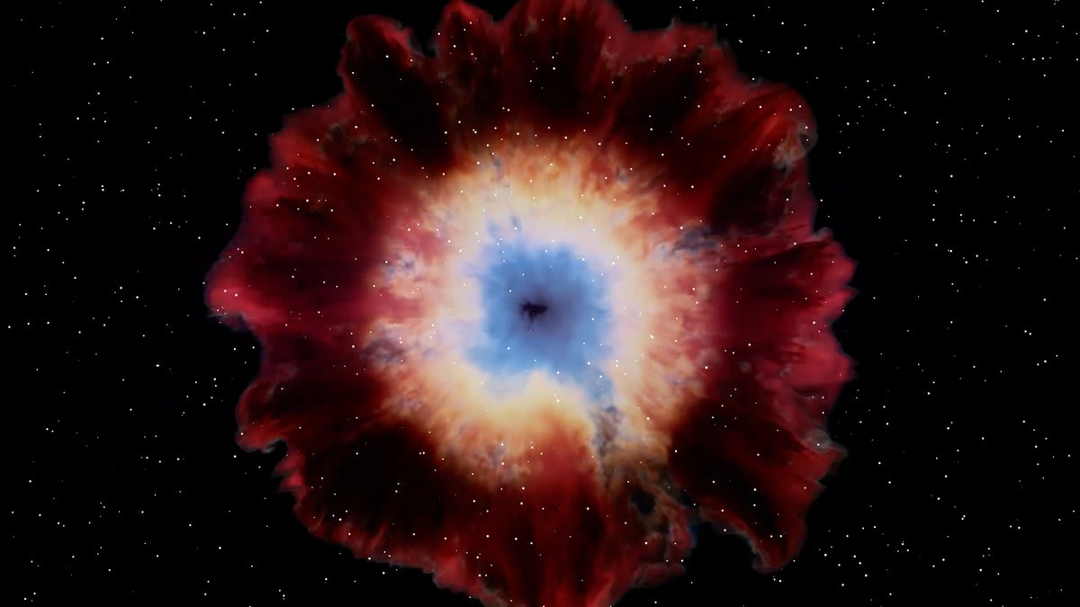 Bright arcing bow shocks ripple through the glowing Helix Nebula's outer edges