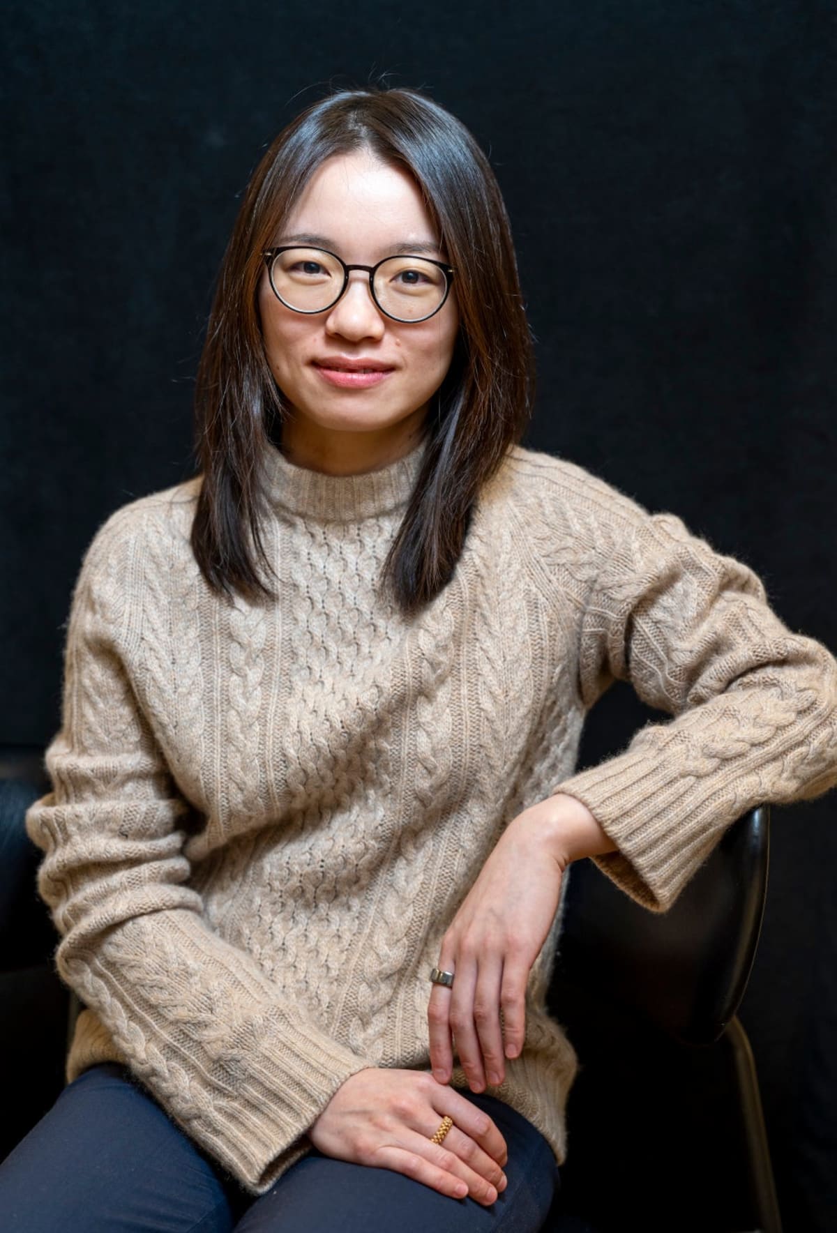 Hong Wang smiling in professional photo after winning prestigious Fields Medal for mathematics