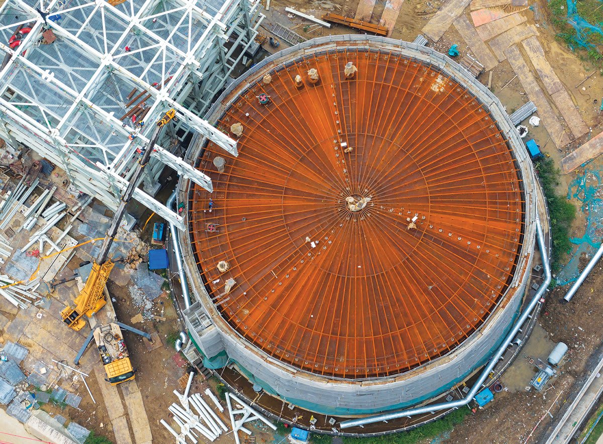 Underwater tidal turbine with large blades spinning in ocean current off Scottish coast