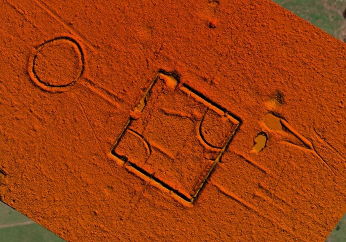 Aerial lidar image showing geometric earthwork patterns carved into Amazon forest ground in Brazil