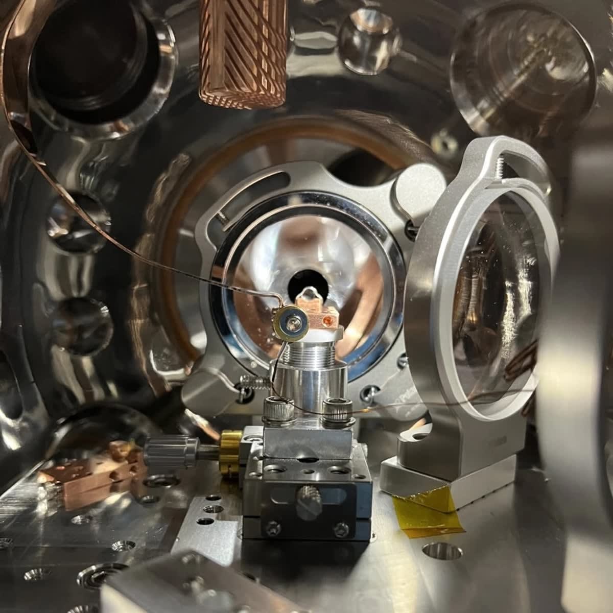 Inside view of vacuum chamber holding thorium-doped crystals for nuclear clock research