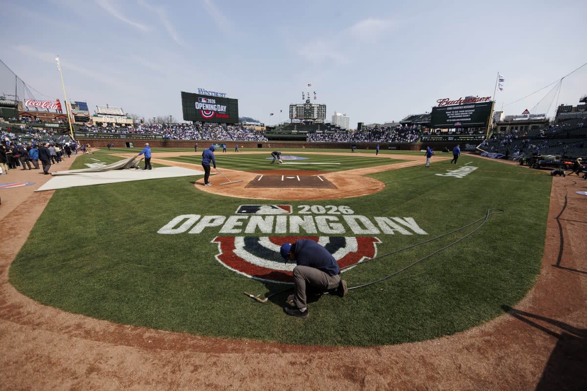 Baseball stadium during Opening Day with umpire using new robot technology calling strikes