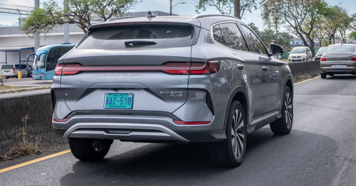 Electric SUV charging at rainforest eco-lodge in Costa Rica's Pacific coast region